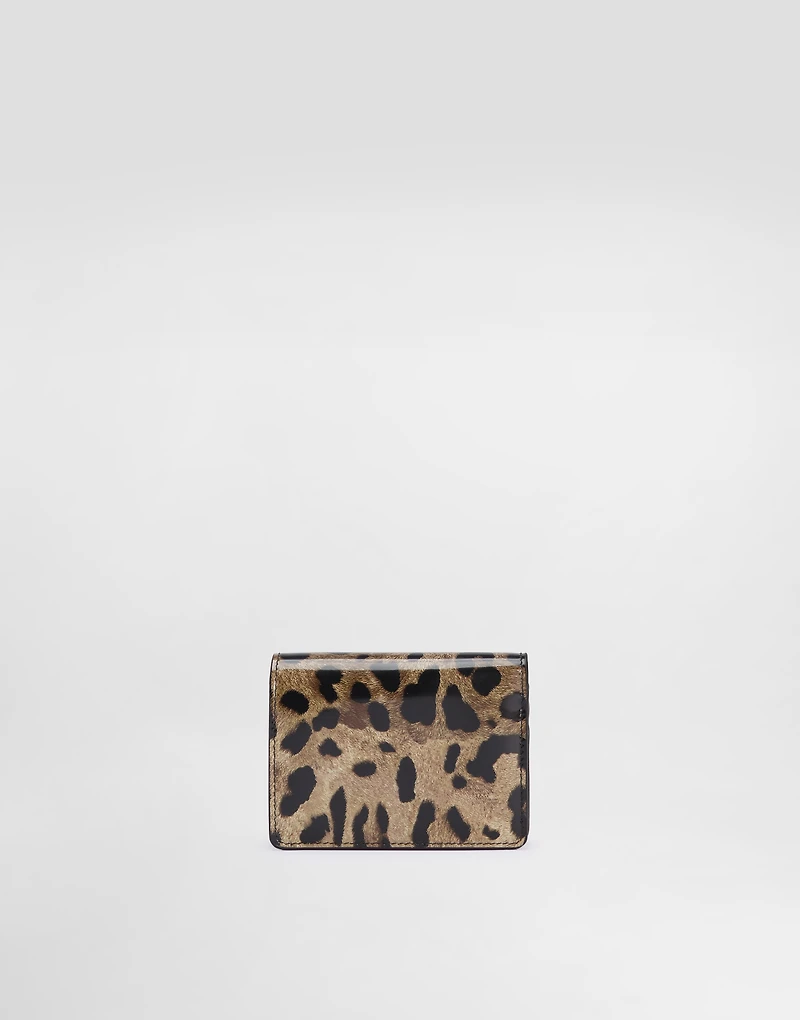 Polished calfskin wallet with leopard print