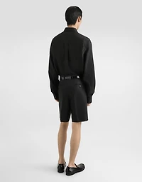 Linen shirt with heraldic patch