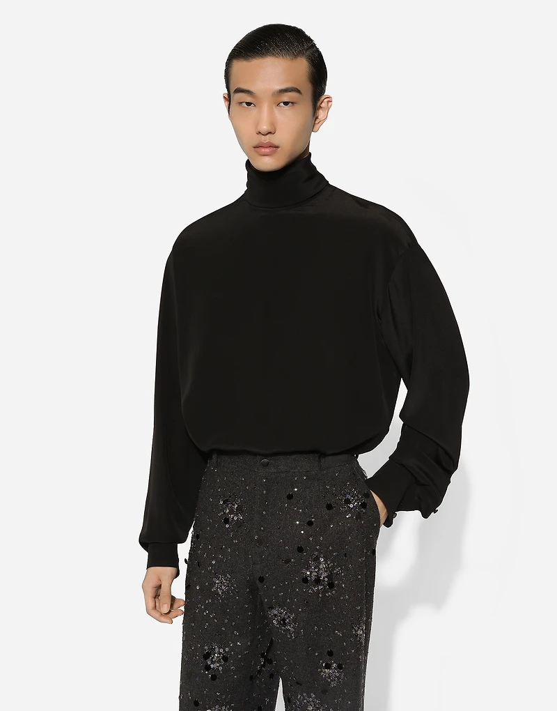 Loose silk turtleneck with shirt cuffs