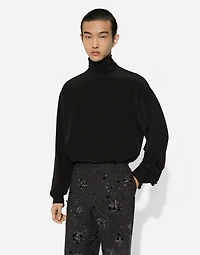 Loose silk turtleneck with shirt cuffs