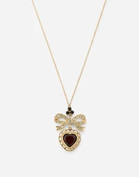 Devotion Pendant
 18 carat yellow gold, red garnet and gray sapphires