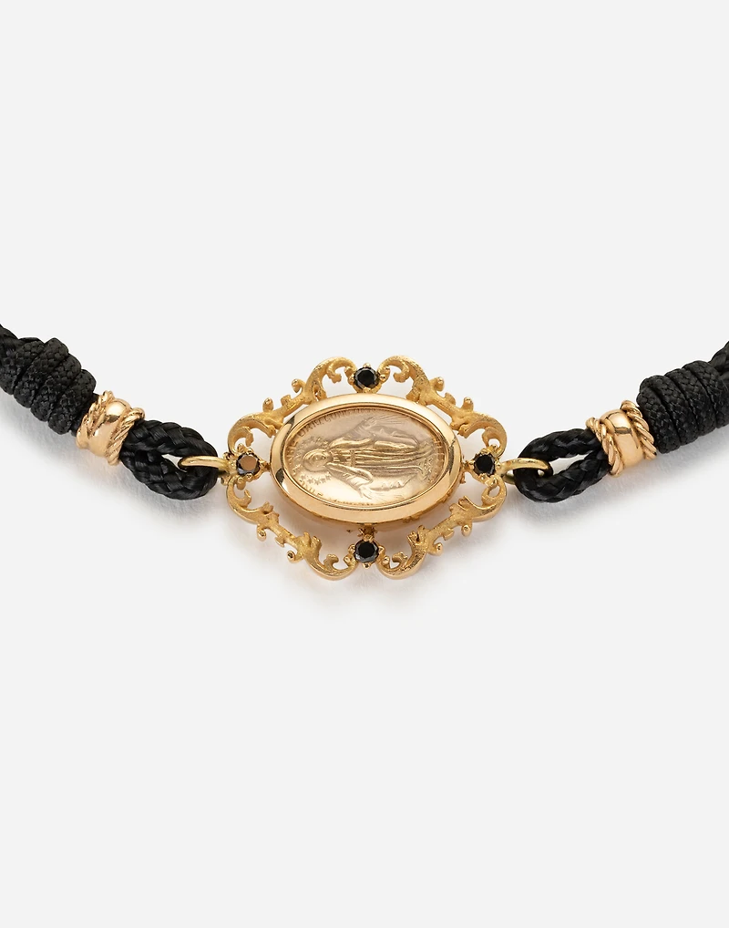  Sicily Bracelet
 fabric with a pendant in 18 carat yellow gold