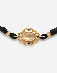  Sicily Bracelet
 fabric with a pendant in 18 carat yellow gold