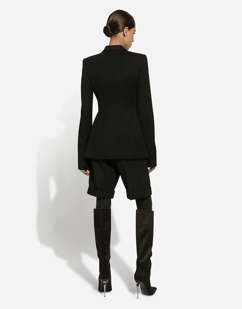 Double-breasted woolen jacket with side vents