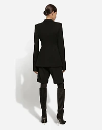 Double-breasted woolen jacket with side vents