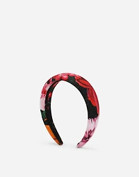 Viyella hairband with floral print over a black background
