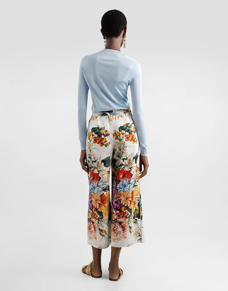 Silk pullover with flower brooch