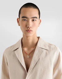 Metal necklace with gemstones and charms