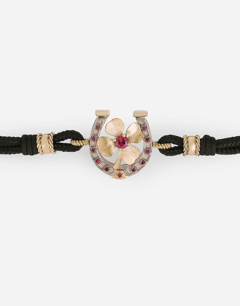  Good Luck Bracelet fabric with a pendant in 18 carat yellow gold
