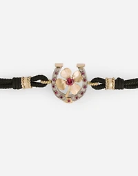  Good Luck Bracelet fabric with a pendant in 18 carat yellow gold