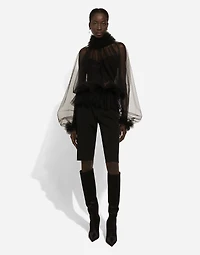 Tulle blouse with ruffles on the neck and cuffs