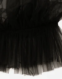 Tulle blouse with ruffles on the neck and cuffs