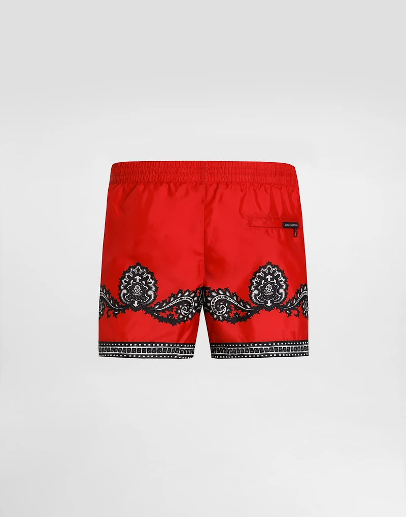 Short swim trunks with bandanna print