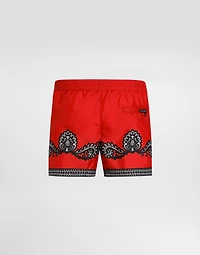 Short swim trunks with bandanna print