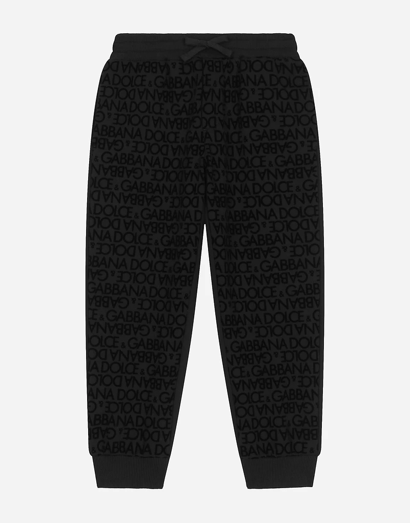 Jersey jogging pants with all-over flocked print