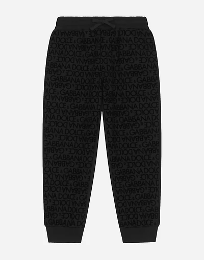 Jersey jogging pants with all-over flocked print