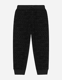 Jersey jogging pants with all-over flocked print