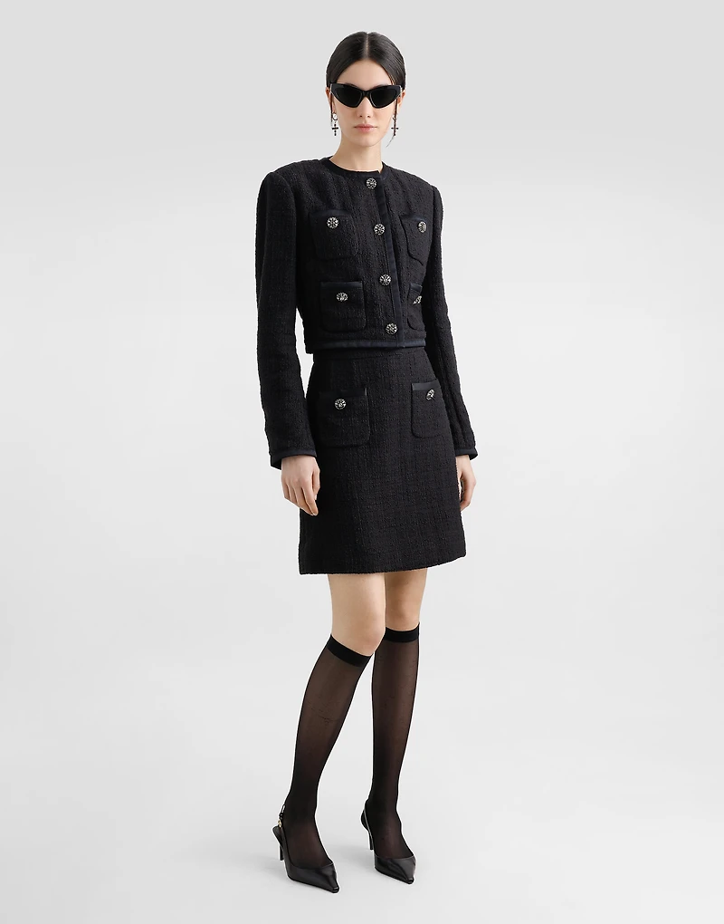 Short raschel tweed A-line skirt with bejeweled buttons