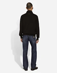High-necked leather and wool jacket