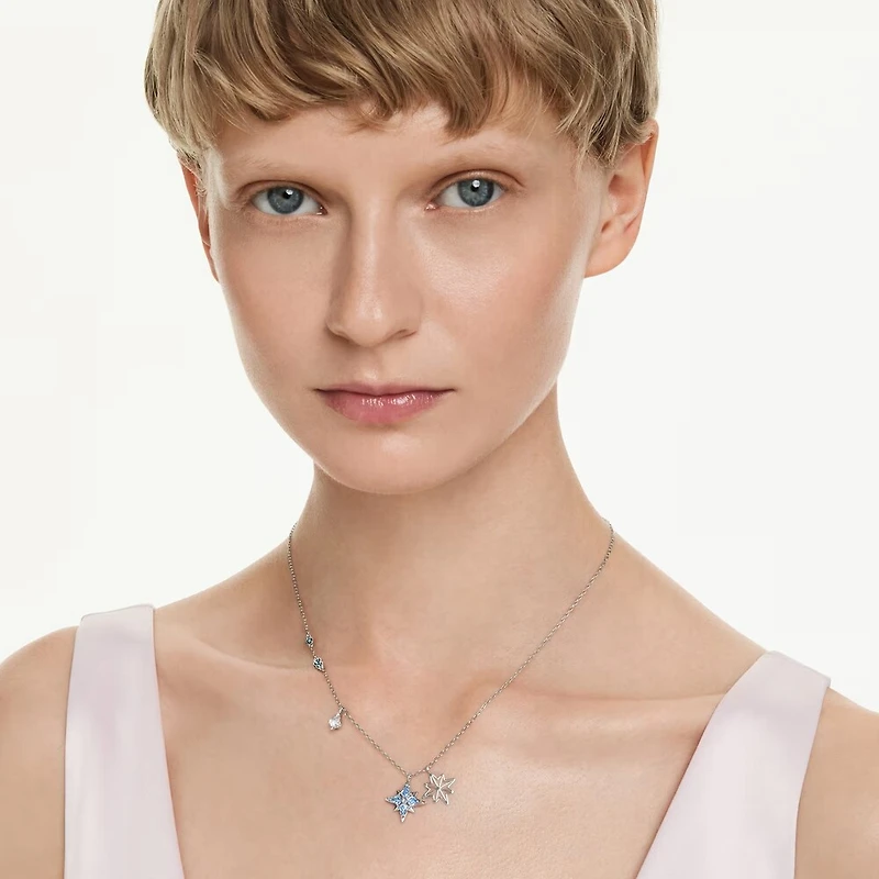 Pendentif Symbolica en Métal Rhodié avec Cristal Swarovski Étoile Bleu. Color: blanc | Doucet Latendresse