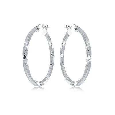 Twisted hoop earrings - 10K white Gold. Color: white | Doucet Latendresse