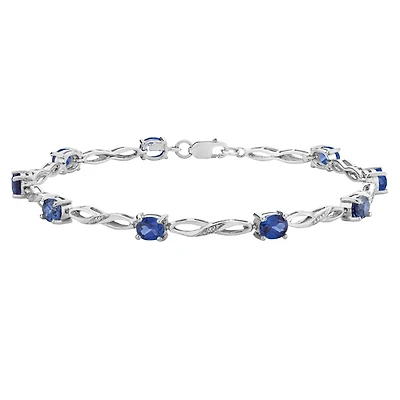 Bracelet in sterling silver with created sapphires 1.90 Carat T.W. and diamond accent. Color: white | Doucet Latendresse