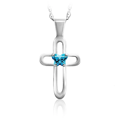 BFLY cross pendant for children set with a blue cubic zirconia (month of December) - Sterling silver. Color: silver | Doucet Latendresse