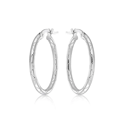 Hoop earrings in 10K white Gold - 20mm x 15mm. Color: white | Doucet Latendresse