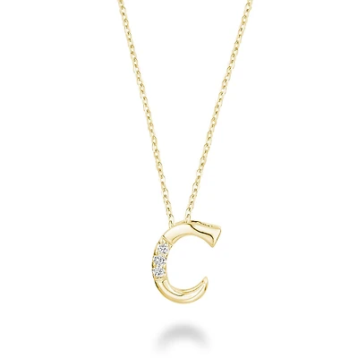C-shape pendant in 10K yellow gold with 3PTS diamonds. Color: yellow | Doucet Latendresse