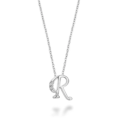 Pendant shape R in 10K white gold with 3PTS diamonds. Color: white | Doucet Latendresse