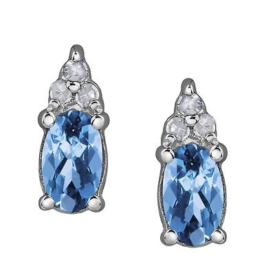 Oval Blue Topaz Earrings - 10k Gold & Diamonds. Color: white | Doucet Latendresse