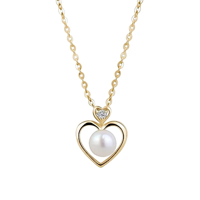 10K Gold Heart Necklace with Freshwater Pearl and Cubic Zirconia. Color: yellow | Doucet Latendresse