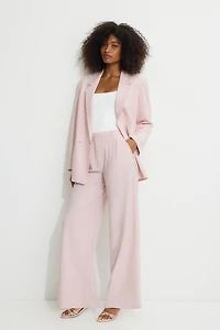Pantalon plissé à jambe large
