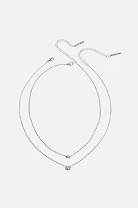 Ensemble de 2 colliers à pierres et rouleau
