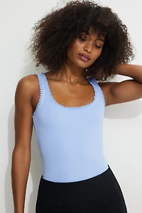 Ribbed Ruffle Trim Bodysuit
