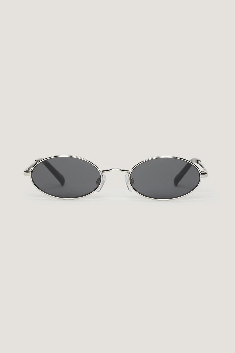 LE SPECS | Lunettes de soleil ovales minces « Love Train »