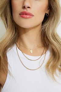 Ensemble de 3 colliers avec médaillon