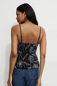 Camisole à basque et broderies