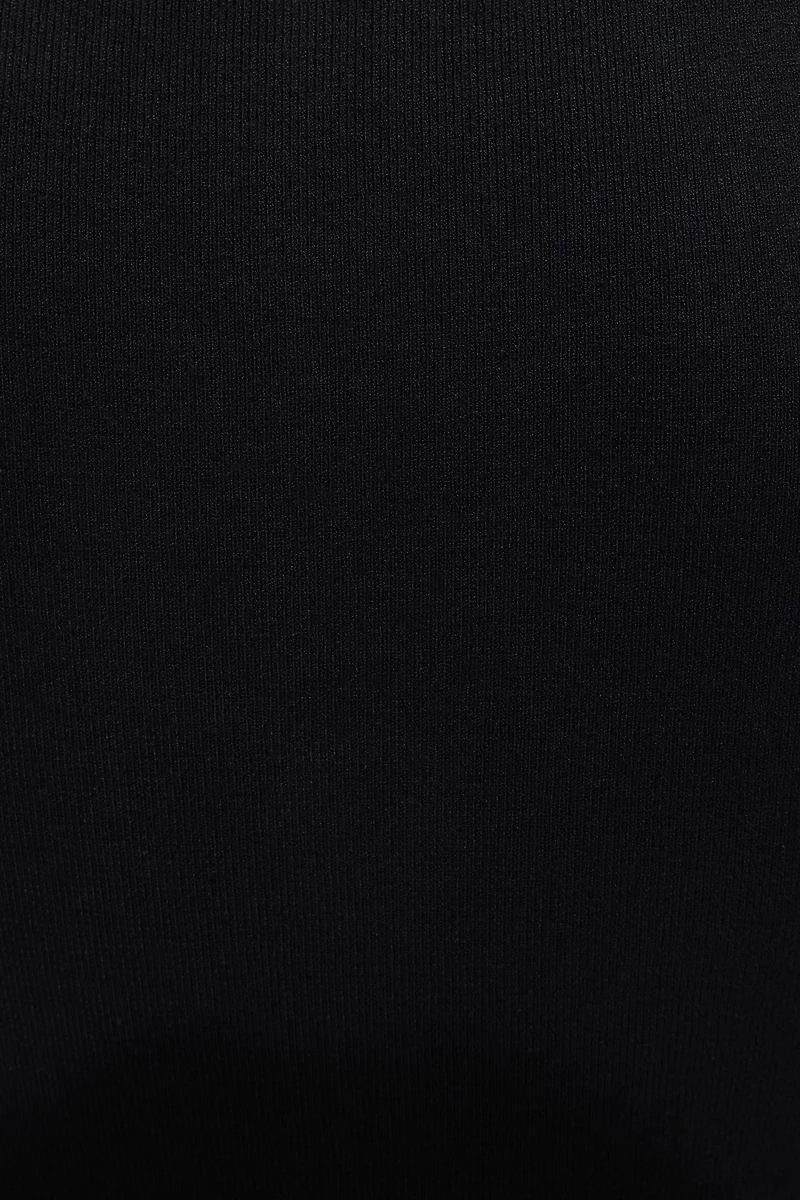 Veste sans manches côtelée à boutons nacrés