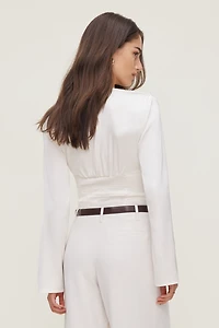 Blouse drapée en satin à col V