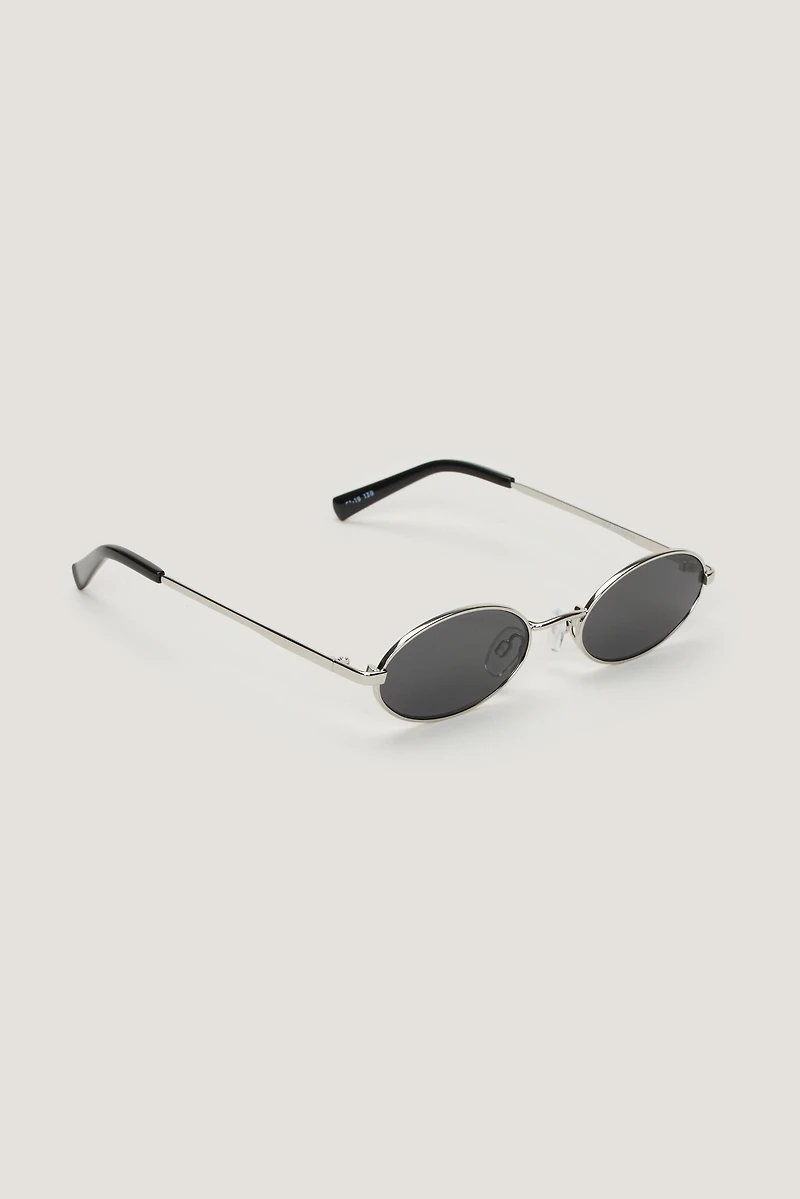 LE SPECS | Lunettes de soleil ovales minces « Love Train »