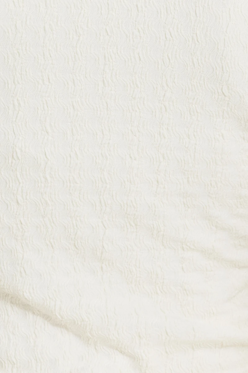 Veste sans manches ouverte texturée à col en V