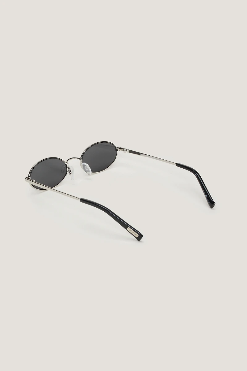 LE SPECS | Lunettes de soleil ovales minces « Love Train »