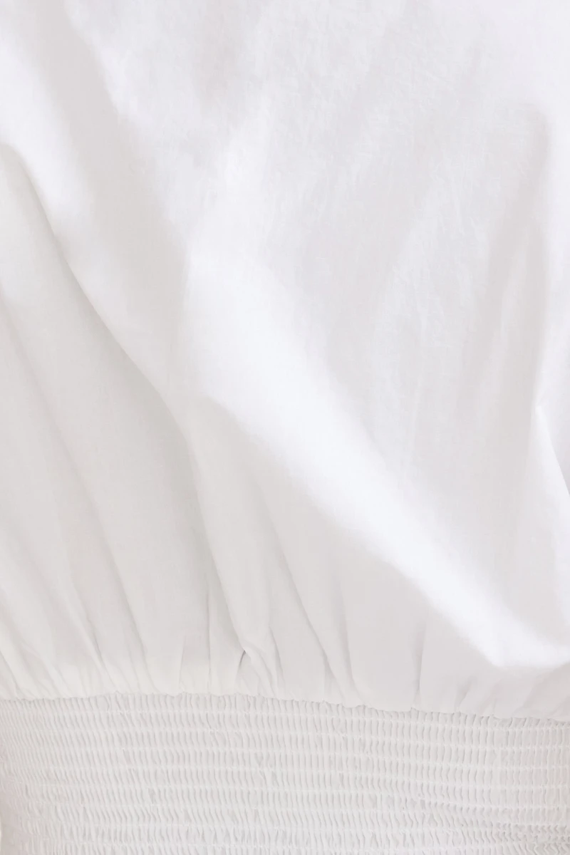 Blouse en popeline à taille smockée