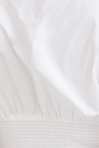 Blouse en popeline à taille smockée