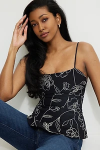 Camisole à basque et broderies