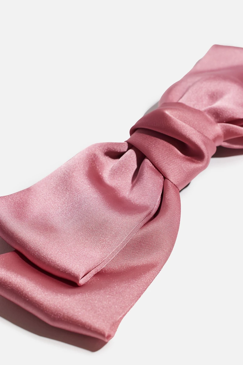 Pince à cheveux avec boucle double souple