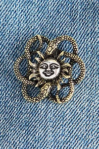 Coiled Snake Sun Brooch