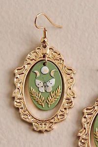 Green Moth Ornate Oval Frame Earrings