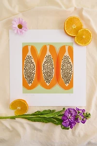 Papaya on Green Background Art Print